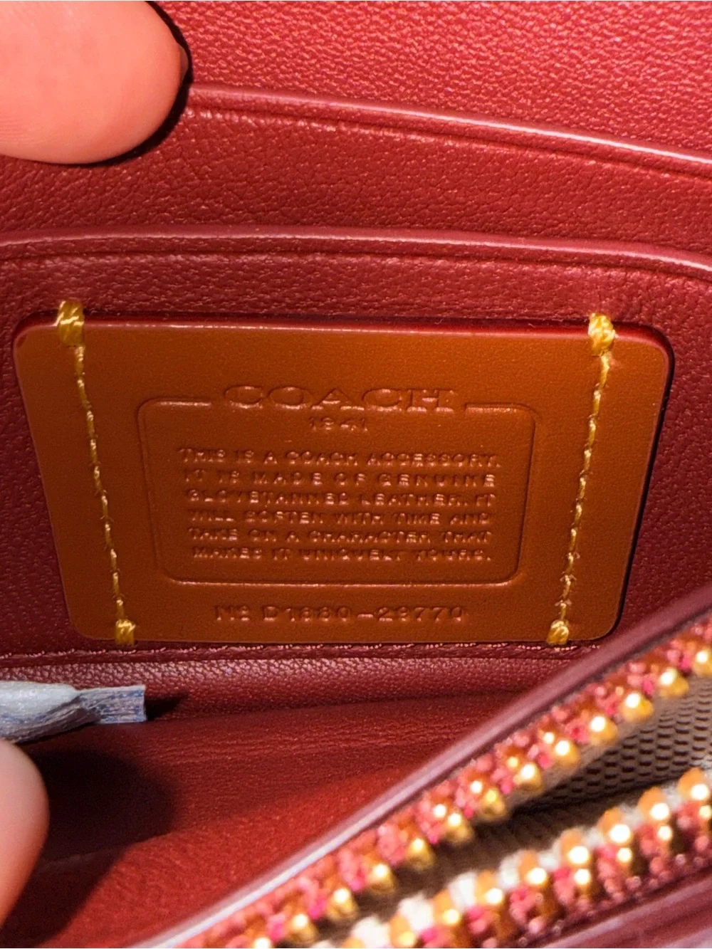 Coach 1941 rose clutch glove tanned leather